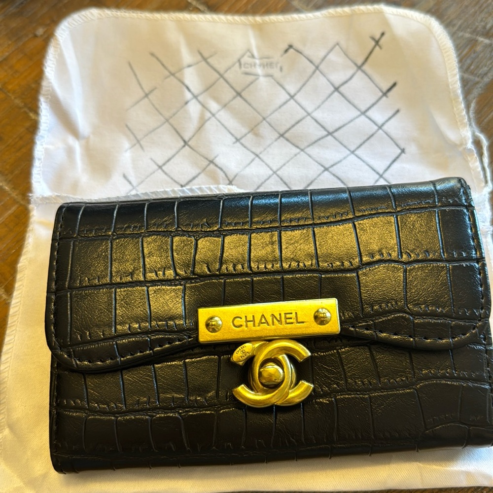 Black leather wallet, unsure of authenticity was a gift